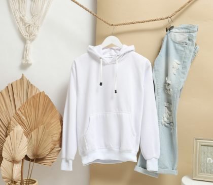 white zip up jacket hanging on brown wooden clothes hanger